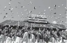  ?? Michael M. Santiago/Getty Images ?? West Point graduates celebrate Saturday after the 2022 West Point Commenceme­nt Ceremony in West Point, N.Y.