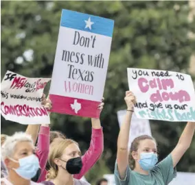  ?? ?? In this October 2, 2021, file photo, people supporting abortion rights attend the Women’s March ATX rally, at the Texas State Capitol in Austin, Texas.