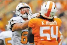  ?? STAFF FILE PHOTO BY C.B. SCHMELTER ?? UTC offensive lineman Cole Strange, left, is expected to lead the way for a position group that brings back starters at four of five spots entering the 2020 season, which is set to kick off Sept. 3 at Western Kentucky.