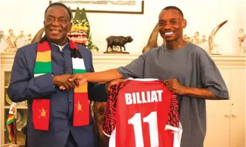  ?? ?? President Mnangagwa receives Khama Billiat’s Yadah FC jersey from the midfielder at State House yesterday