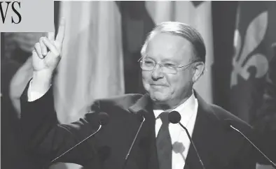  ?? PAUL CHIASSON / THE CANADIAN PRESS FILES ?? Bernard Landry salutes as he’s acclaimed leader of the Parti Québécois on March 2, 2001. Landry has died at age 81.