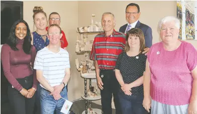  ?? [SUBMITTED] ?? The Snowgoose Apartments team unveil their sculpture to Kitchener-Conestoga MP Harold Albrecht. On the left is Meera Bavanandan and Mark Allison in front, Sarah Bryson behind them, and Joel Martin in the back. Right of the sculpture is Raymond Haid,...