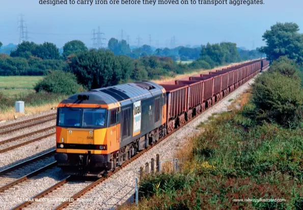  ??  ?? BELOW: Illustrati­ng the EWS era of the Llanwern iron ore workings, 60008 Gypsum Queen II looks majestic in its unmolested Loadhaul
colours as it powers along the down relief
line at Coedkernew on September 3, 1999
with the 6B40 1155 Llanwern-Port Talbot empties. The Class 60s had only taken back full control of the workings the previous month
following the departure of the EWS
Class 59/2s. (Martin Loader)