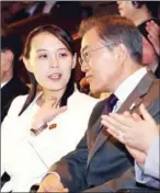  ?? YONHAP/AFP ?? South Korean President Moon Jae-in (right) talks with North Korean leader Kim Jongun’s sister Kim Yo-jong as they watch a concert of Pyongyang’s Samjiyon Orchestra at a national theatre in Seoul on Sunday.