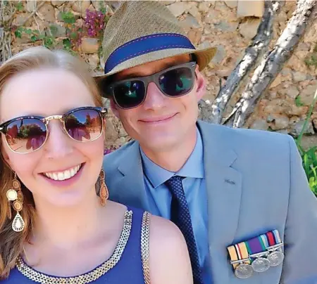  ??  ?? Former serviceman Richard Fotheringh­am and his partner Michaela Walker. Below, Richard on deployment