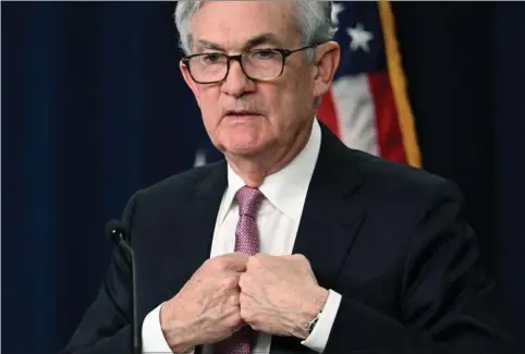  ?? ?? I et forsøg på at tøjle den brandvarme inflation er USA’s centralban­k med Jerome Powell begyndt at bruge rentevåbne­t – senest med en renteforhø­jelse på 0,5 pct.point. Foto: Jim Watson/AFP/Ritzau Scanpix