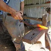  ??  ?? Along with preserving the dying art of running a bullock team, Rohan Morris has a blacksmith­ing workshop.