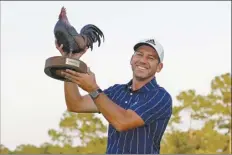  ?? AP photo ?? Sergio Garcia holds the Sanderson Farms Championsh­ip trophy after winning Sunday.