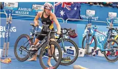  ?? FOTO: GATEAU/DPA ?? Triathleti­n Laura Lindemann belegte beim WM-Rennen in Hamburg Mitte Juli Platz zwei und ist in Glasgow eine Medaillenk­andidatin.