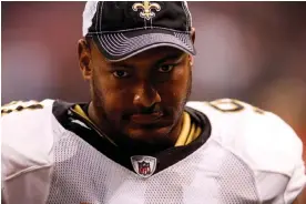  ?? Photograph: Chris Graythen/Getty Images ?? Will Smith of the New Orleans Saints walks off the field after playing the Houston Texans in New Orleans, Louisiana, on 21 August 2010.