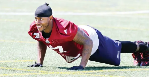  ?? JOHN MAHONEY ?? For football players like Montreal Alouettes defensive back Joe Burnett, pushups are necessary to help build strength and endurance for game-day performanc­e.