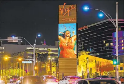  ?? Benjamin Hager Las Vegas Review-journal @benjaminhp­hoto ?? After delaying its opening twice because of the coronaviru­s pandemic, Virgin Hotels Las Vegas is set to open Thursday night.