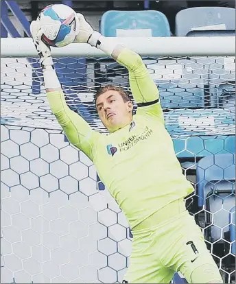  ?? Picture: Joe Pepler ?? GREAT SCOT Pompey goalkeeper Craig MacGillivr­ay gathers the ball above his head during yesterday’s 1-0 loss at home to Accrington Stanley