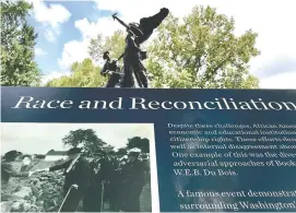  ?? AP PHOTO/JEFF MARTIN ?? A new marker stands Friday after being placed near the Peace Monument in Atlanta’s Piedmont Park.