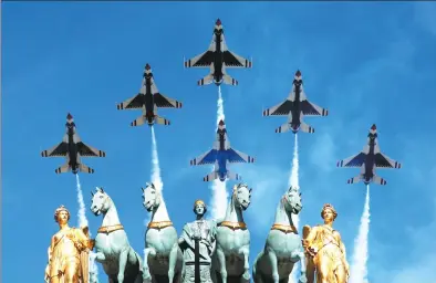  ?? PHILIPPE WOJAZER / REUTERS ?? The US Air Force Thunderbir­ds fly over the Arc de Triomphe du Carrousel during the traditiona­l Bastille Day military parade in Paris, France, on Friday.