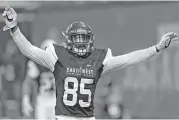  ?? Chris O’Meara / Associated Press ?? UH wide receiver Steven Dunbar celebrates after making a 34-yard touchdown catch to lift the West to a 14-10 victory in Saturday’s East-West Shrine game.