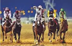  ?? Virendra Saklani/Gulf News Archives ?? California Chrome, ridden by Victor Espinoza, wins the Dubai World Cup 2016. The speed, the explosive power, the excitement of the contest, consume everything for a wonderful few minutes.