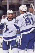  ??  ?? Lightning forwards Steven Stamkos and Nikita Kucherov, left, are first and second in points in the NHL.
JASEN VINLOVE/USA TODAY SPORTS