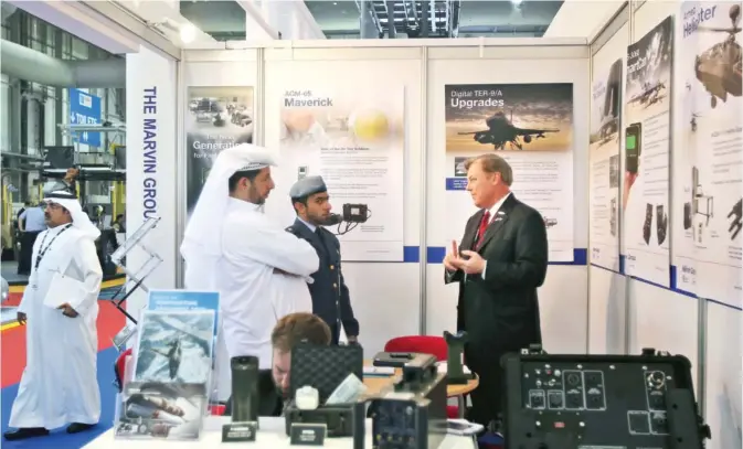  ??  ?? DUBAI: Emiratis visit the US Pavilion during the third day of the Dubai Airshow in Dubai on Tuesday. — AP