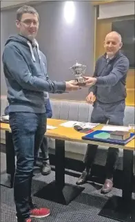  ??  ?? Andrew Ralston receiving the Premier Breeders Trophy from chairman Malcolm Ronald.