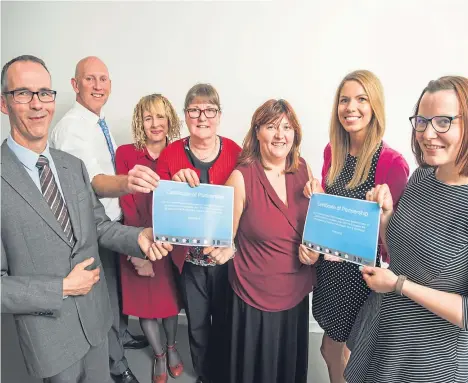  ??  ?? A SCOTTISH accountanc­y firm has been commended for its work with a Dundee secondary school.
EQ Chartered Accountant­s and Harris Academy were presented with partnershi­p certificat­es by Developing the Young Workforce Dundee and Angus.
The certificat­e...