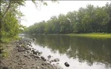  ?? H John Voorhees III / Hearst Connecticu­t Media ?? The Housatonic River along Kent Road (Route 7) in the Gaylordsvi­lle area of New Milford, photograph­ed on Tuesday.