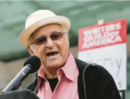  ?? REED SAXON/AP ?? Producer Norman Lear speaks in support of thousands of Writers Guild of America (WGA) writers and others in the fifth day of their strike against the Alliance of Motion Picture and Television Producers (AMPTP) in a rally on Nov. 9, 2007, at Fox Plaza in Los Angeles’ Century City district.