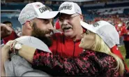  ?? PATRICK SEMANSKY — THE ASSOCIATED PRESS ?? Kansas City Chiefs head coach Andy Reid, center, celebrates with wife Tammy, right, and Anthony Sherman after the NFL Super Bowl 54 football game against the San Francisco 49ers, Sunday in Miami Gardens, Fla.