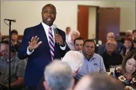  ?? CHARLIE NEIBERGALL — THE ASSOCIATED PRESS ?? Sen. Tim Scott, R-S.C., speaks during an Iowa GOP reception in Cedar Rapids on Thursday.