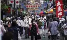  ?? Photograph: Eugene Hoshiko/AP ?? A report by the University of Washington predicts that Japan’s population will halve by by 2100.