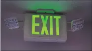  ?? RECORDER PHOTO BY ALEXIS ESPINOZA ?? The New Portervill­e Rescue Mission has been working towards bringing their building up to code, and the first phase has been complete. Exit signs, like the one shown here, have been installed throughout the building.