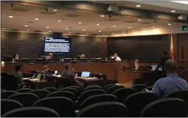  ?? NATALIE HANSON — ENTERPRISE-RECORD ?? Councilor Sean Morgan, seated on the right side of the dais, asks the Chico City Council on Tuesday to suspend a particular public hearing until a February meeting.