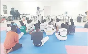  ?? (Courtesy pic) ?? Eswatini Taekwondo Coach Wandile Maziya conducting anti-doping classes.