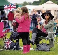  ??  ?? Pictures from the Poynton Party in the Park by Joel Goodman