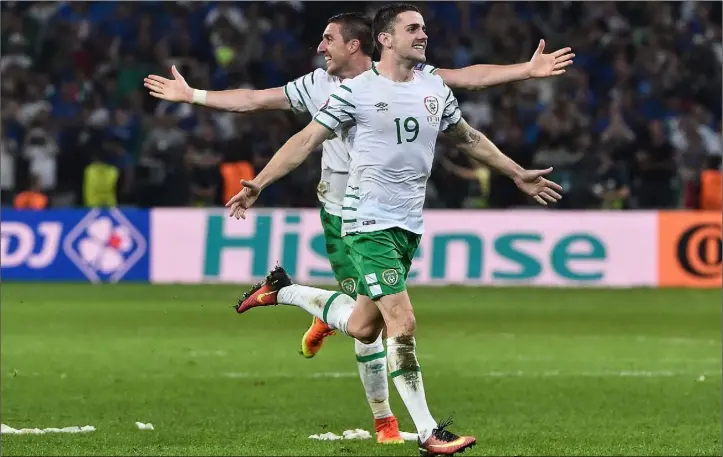  ?? Photo: David Maher / Sportsfile ?? Goal hero Robbie Brady and Stephen Ward celebrate following the Republic of Ireland’s victory over Italy at Euro 2016 in Lille.