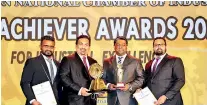  ??  ?? Lanka SSL CEO Pravin De Silva (second from left) with awards: (From left) AM Material Management Ishan Buddhika, Head of Plant Operation Lalinda Geekiyanag­e and Head of Sales and Marketing Gayan Pathinayak­a