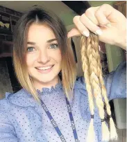  ??  ?? Pictured is Olivia Smith with the hair that she had cut off to raise funds for the Little Princess Trust.