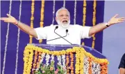  ??  ?? Prime Minister Narendra Modi at the dedication of a `1,500crore canal to the people in Botad, Gujarat. Earlier, he inaugurate­d a multi-super speciality hospital and research centre in Surat on Monday. — PTI