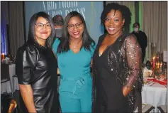  ?? (NWA Democrat-Gazette/Carin Schoppmeye­r) ?? Ebony Wyatt (from left), Azizi Wilborn and Jaclyn House enjoy the Big Night Gala at the Jones Center.