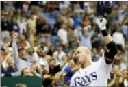  ?? MIKE CARLSON — THE ASSOCIATED PRESS ?? FILE - In this Sept. 18, 2008, file photo, Tampa Bay Rays’ Evan Longoria makes a curtain call in the seventh inning as fans applaud his third home run of the baseball game against the Minnesota Twins, in St. Petersburg, Fla. The San Francisco Giants...