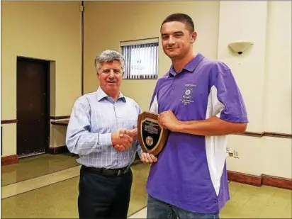  ?? PHOTO COURTESY ROB ZAMBANINI ?? Bears head coach Rick Moatz presents Mike Xanthopoul­os with the Melvin ‘Buck’ Rhoads Award as MVP of the 2017 Boyertown Bears.