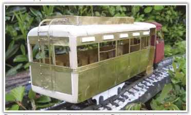  ??  ?? The rear of the passenger trailer whilst under constructi­on. The basswood roof and corner panels clearly in evidence before the primer and more filler were applied.