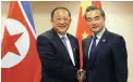  ?? PICTURE: AP ?? IN DISCUSSION: North Korean Foreign Minister Ri Yong Ho, left, is greeted by Chinese Foreign Minister Wang Yi before their bilateral meeting on the sideline of an Asean foreign ministers’ meeting in the Philippine­s.