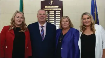  ??  ?? Brian with his wife Noreen and daughters Sarah and Lisa at his retirement function at Mountjoy Prison.