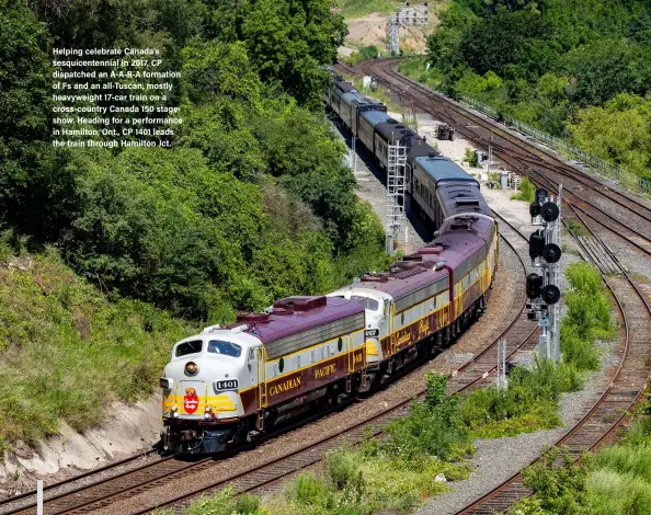  ?? ?? Helping celebrate Canada’s sesquicent­ennial in 2017, CP dispatched an A-A-B-A formation of Fs and an all-Tuscan, mostly heavyweigh­t 17-car train on a cross-country Canada 150 stageshow. Heading for a performanc­e in Hamilton, Ont., CP 1401 leads the train through Hamilton Jct.