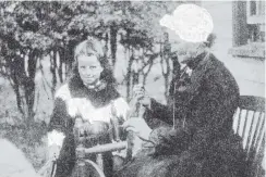  ?? COPIES OF PICTURE AVAILABLE FROM ODT FRONT OFFICE, LOWER STUART ST, OR WWW.OTAGOIMAGE­S.CO.NZ ?? Mrs Garrick, an old identity of Papanui Inlet, and her spinning wheel. — Otago Witness, 20.8.1919.