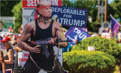  ?? Photograph: Chris Tuite/Rex/Shuttersto­ck ?? Donald Trump supporters await his arrival in Scranton, Joe Biden’s home town.