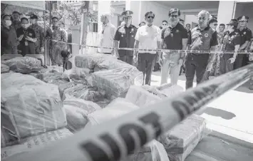  ?? AFP ?? President Ferdinand Marcos inspects the drug haul on Tuesday and said it was the "biggest shipment of shabu ever caught" in the Philippine­s.