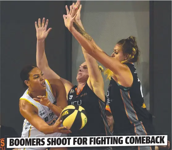  ?? Picture EVAN MORGAN ?? TRAPPED: Boomers star Liz Cambage ( left) is shut down by Fire players Suzy Batkovic and Cayla George during Saturday’s grand final opener.