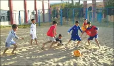  ??  ?? Kabul’s Ghazi stadium was the scene of gruesome executions under Taliban rule, but today it is where Afghan youths, the majority of whom have never seen the sea, dream of representi­ng their landlocked country in beach soccer. Children as young as 8,...